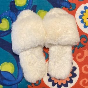 White furry slippers